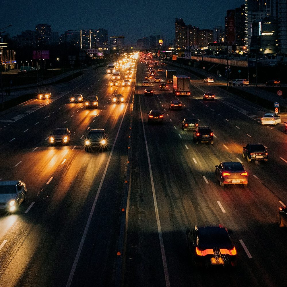 Cars driving at night.